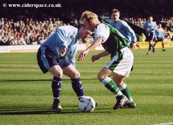 Darren Way attempts to get past a Burscough defender