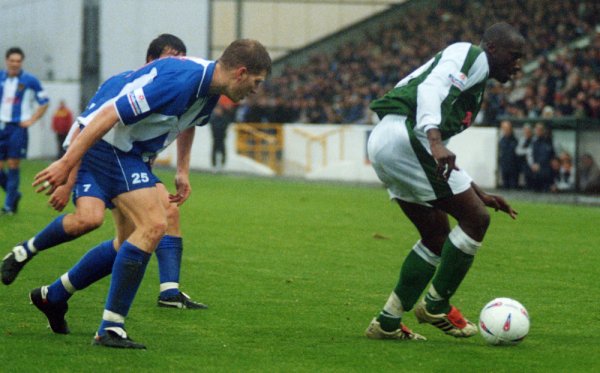 Abdoulai Demba shields the ball from Scott Guyett
