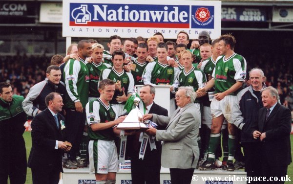 Terry Skiverton takes the Conference trophy, ready to lift
