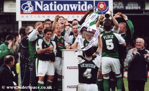 Terry Skiverton turns round and shows his team mates what they are missing out on