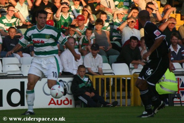 Adrian Caceres cuts past Darlington's Curtis Fleming