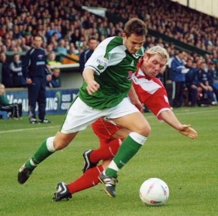 Nick Crittenden forces his way into the Doncaster penalty box