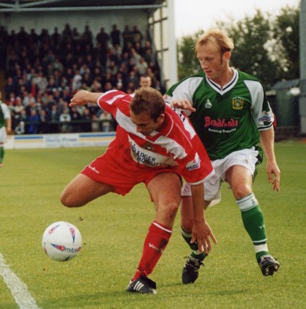 Darren Way attempts to regain possession from a Doncaster player