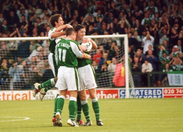 Gavin Williams is mobbed by his team-mates as the Westland Stand goes wild for Yeovil's equaliser