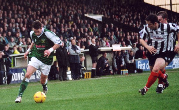 Michael McIndoe makes a surge down the right wing