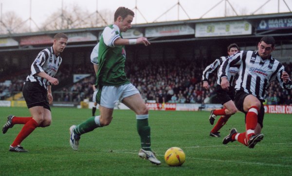 Michael McIndoe sets up to shoot in the Forest Green box