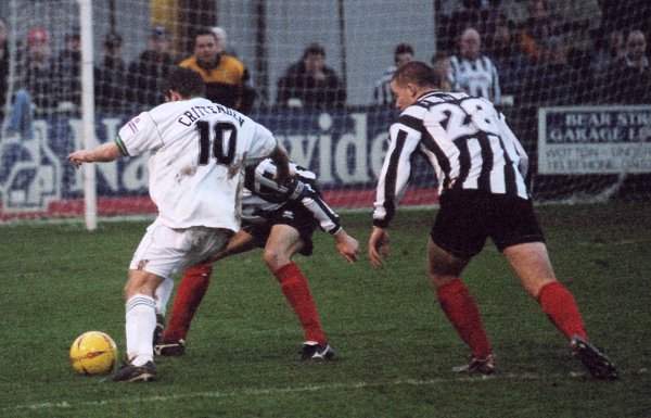 Nick Crittenden cuts into the Forest Green penalty area, shadowed by Darren Jones