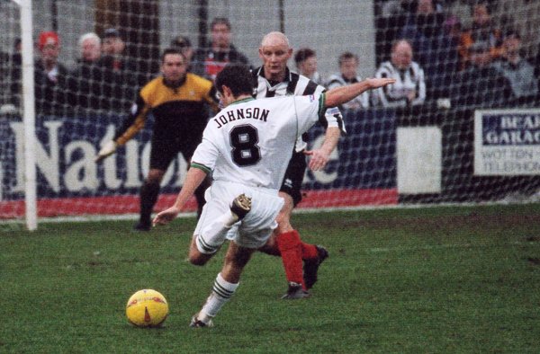Lee Johnson fires in a shot on Forest Green's goal