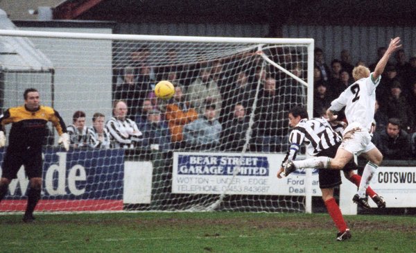 Adam Lockwood and Forest Green's Matthew Coupe challenge for an aerial ball