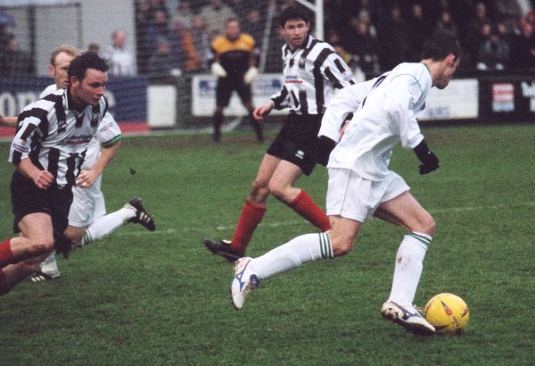 Michael McIndoe cuts into the centre of midfield