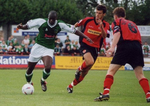 Abdoulai Demba attempts to get past Kettering's Craig Norman