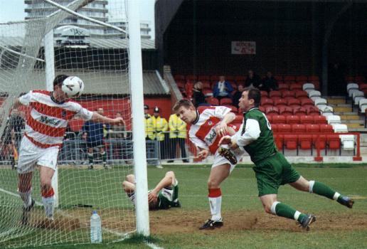 Howard Forinton's diving header opens Yeovil's account in a stunning 4-3 win at Kingstonian