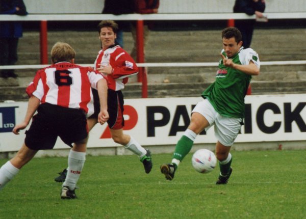 Nick Crittenden skips past Neil Fitzhenry