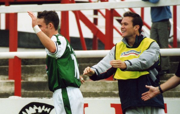 Michael McIndoe celebrates his goal with Chris Giles showing his delight