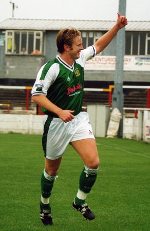 Cheers! Terry Skiverton salutes the away supporters after netting Yeovil's opener