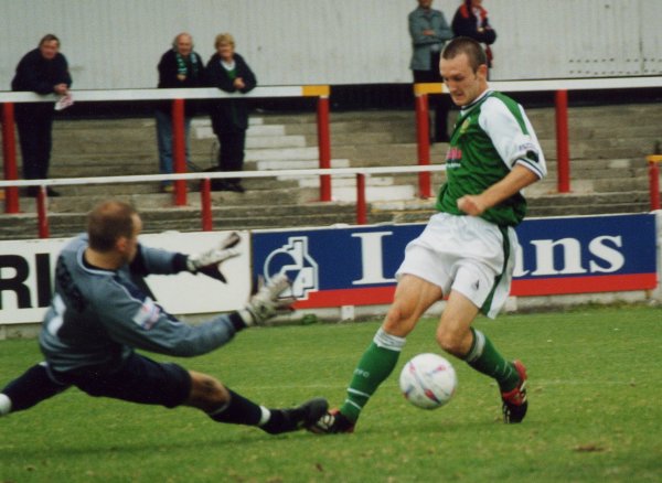 A slighty fuzzy picture as Gavin Williams gets brought down by Leigh keeper Stuart Coburn for another penalty