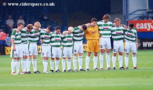 Yeovil Town players show their respect in the minute's silence for former Luton boss Ray Harford