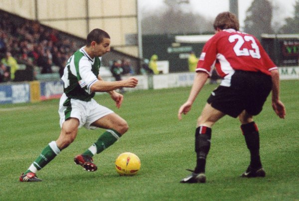 Abdelhalim El Kholti looks to evade Morecambe's Lee Elam