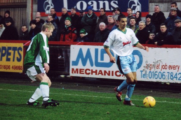 Abdelhalim El Kholti looks to beat Northwich's Steve Walsh