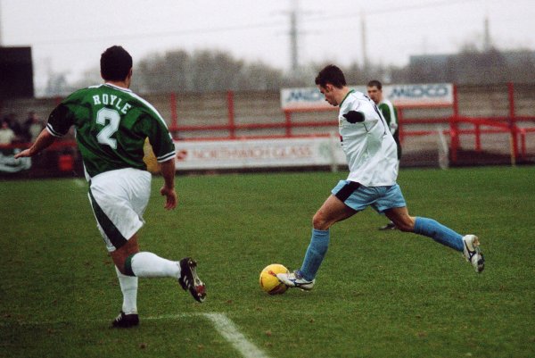 Michael McIndoe with Northwich's Chris Royle