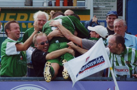 Carl Alford leaps for joy after scoring his first goal for the Glovers at Nuneaton in front of the Sky cameras