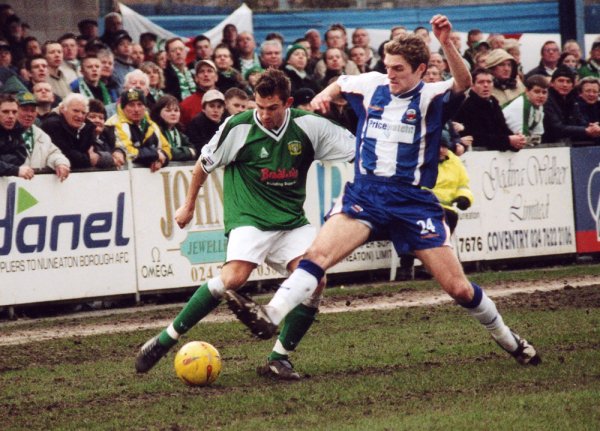 Critts battles to keep the ball in the Nuneaton mud