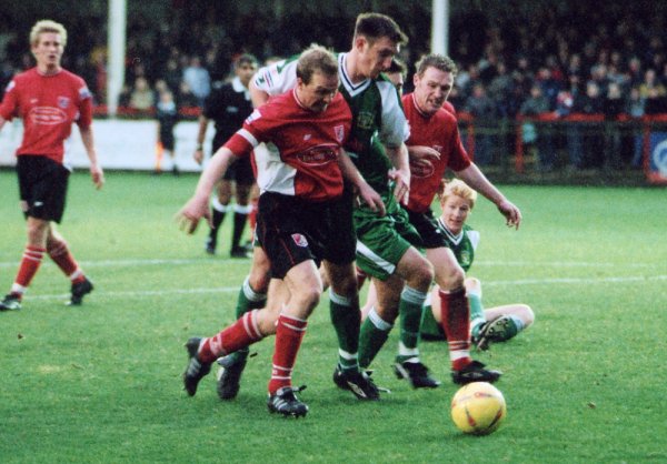 Kirk Jackson gets sandwiched by two Scarborough defenders