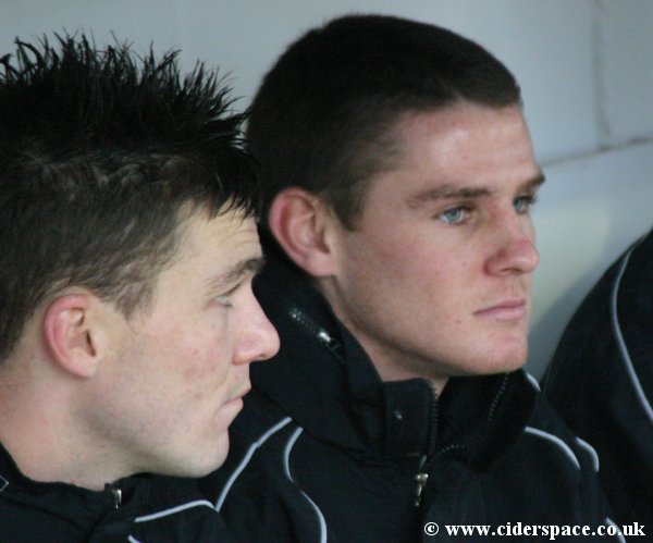 New signing Anthony Barry sits in the dugouts with Kevin Gall