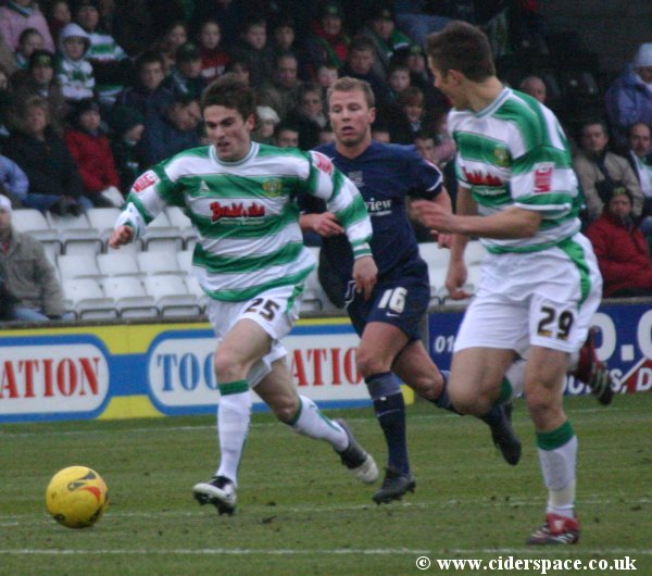 Arron Davies gets support from Chris Cohen in attack