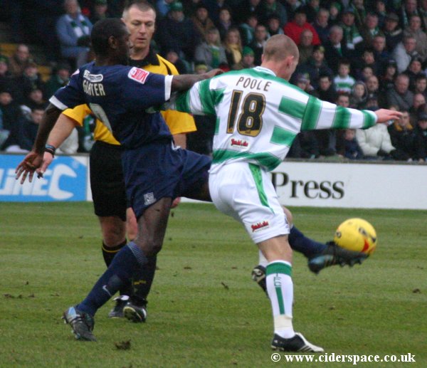 David Poole battles for possession with Southend's Shaun Goater
