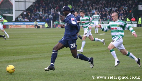 Southend United defender Efetobore Sodje is chased by David Poole