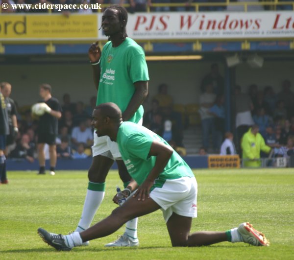 Marcus Richardson and Kevin Amankwaah stretch out during the warm-ups