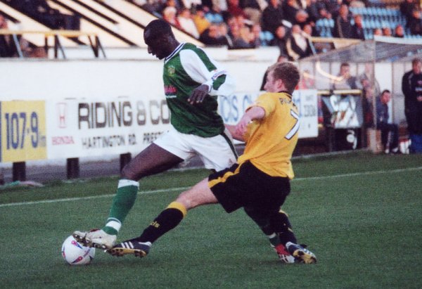 Abdoulai Demba battles for the ball with Southport's Steve Pickford