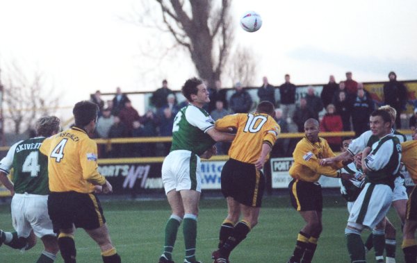 Chris Giles wins his header but can't keep the ball from going over the bar