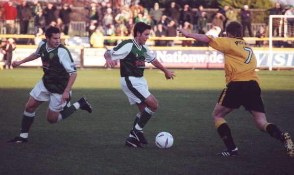Lee Johnson is supported by Nick Crittenden against Southport's Steve Pickford