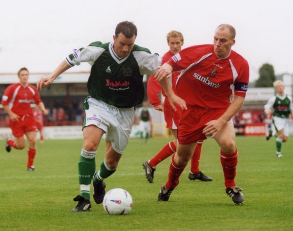 Howard Forinton battles with Stevenage's Jason Goodliffe