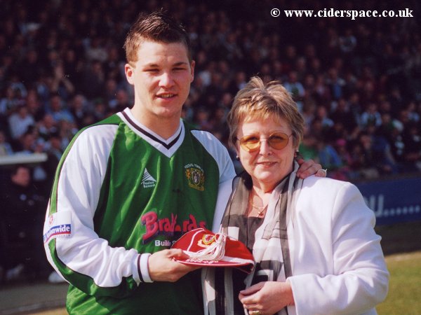 Kevin Gall receives his Welsh Under 20 cap from new club director Jean Cotton