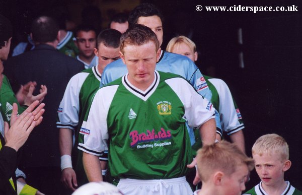 Terry Skiverton leads the Yeovil players out for the game