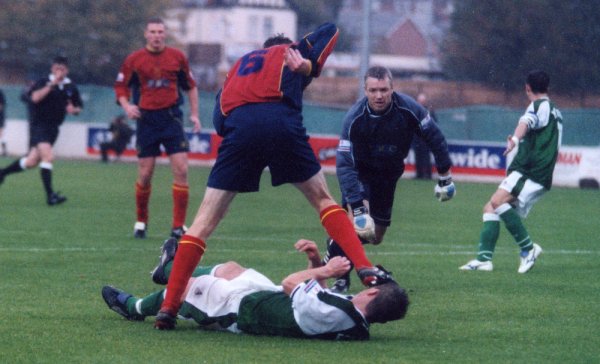 Ouch! Howard Forinton endures a bit of 'afters' from Telford's Grant Brown as the referee blows for a penalty