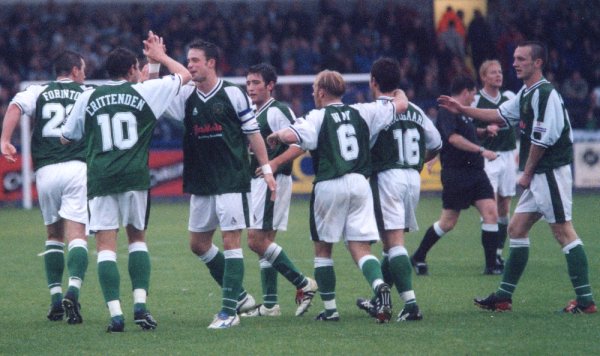 Howard Forinton milks the congratulations of his team-mates after a superb team goal
