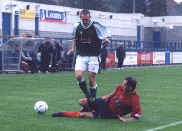 Gavin Williams carefully avoids an incoming Telford defender