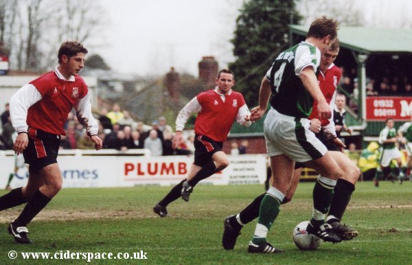 Terry Skiverton tries to make room on the corner of the Woking penalty area