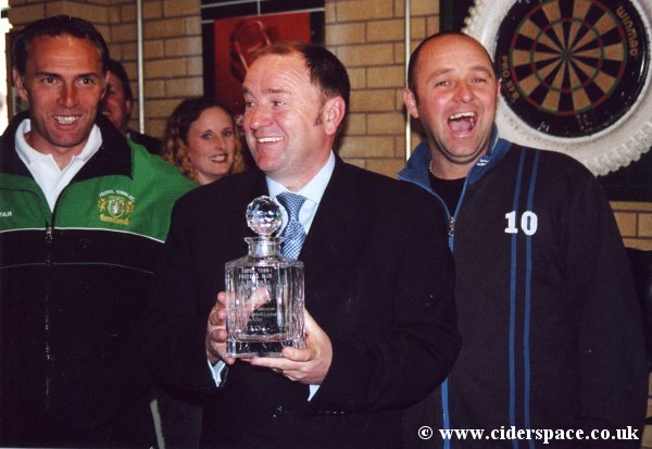 Gary Johnson and Steve Thompson share a joke with an amused YTISA Chairman Mark Kelly as Gary is presented with a memento