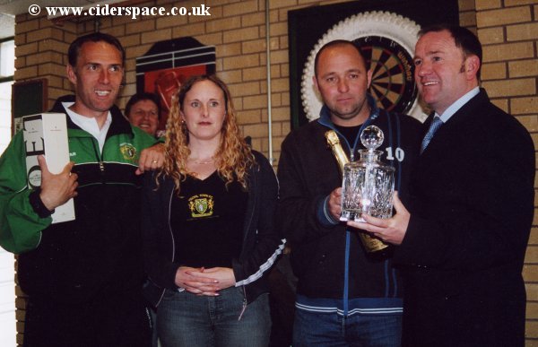 Gary Johnson and Steve Thompson receive their mementos from YTISA's Mark Kelly and Sara Brimble