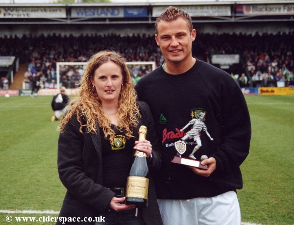 Colin Pluck receives his runner-up award for the YTISA Player of the Season from YTISA Secretary Sara Brimble