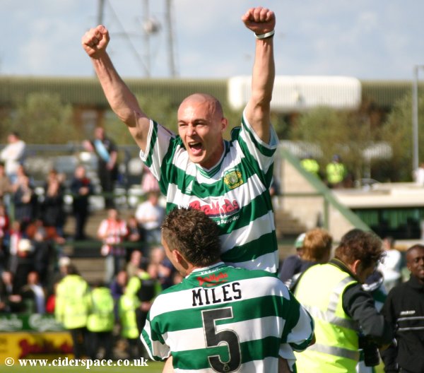 Michael Rose shows his joy with a little help from Colin Miles