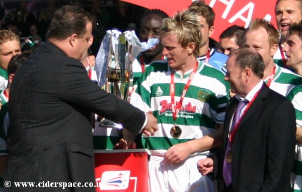 Terry Skiverton shakes hands with the Football League representatives