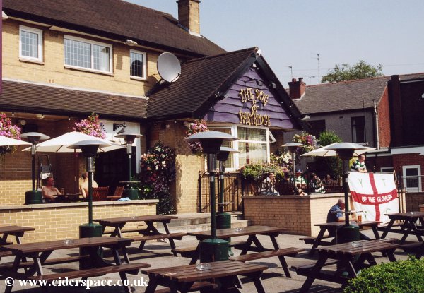 The rather sunny front of the Dog and Partridge
