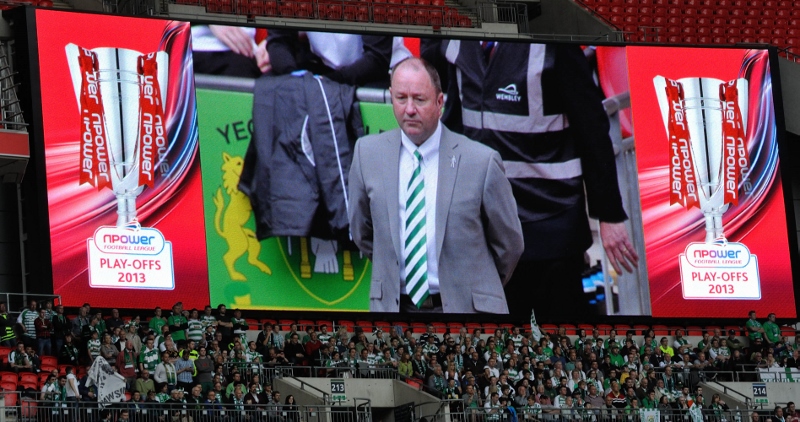 A giant Gary Johnson watches above the Yeovil faithful as the game begins. Photo c/o Yeokel